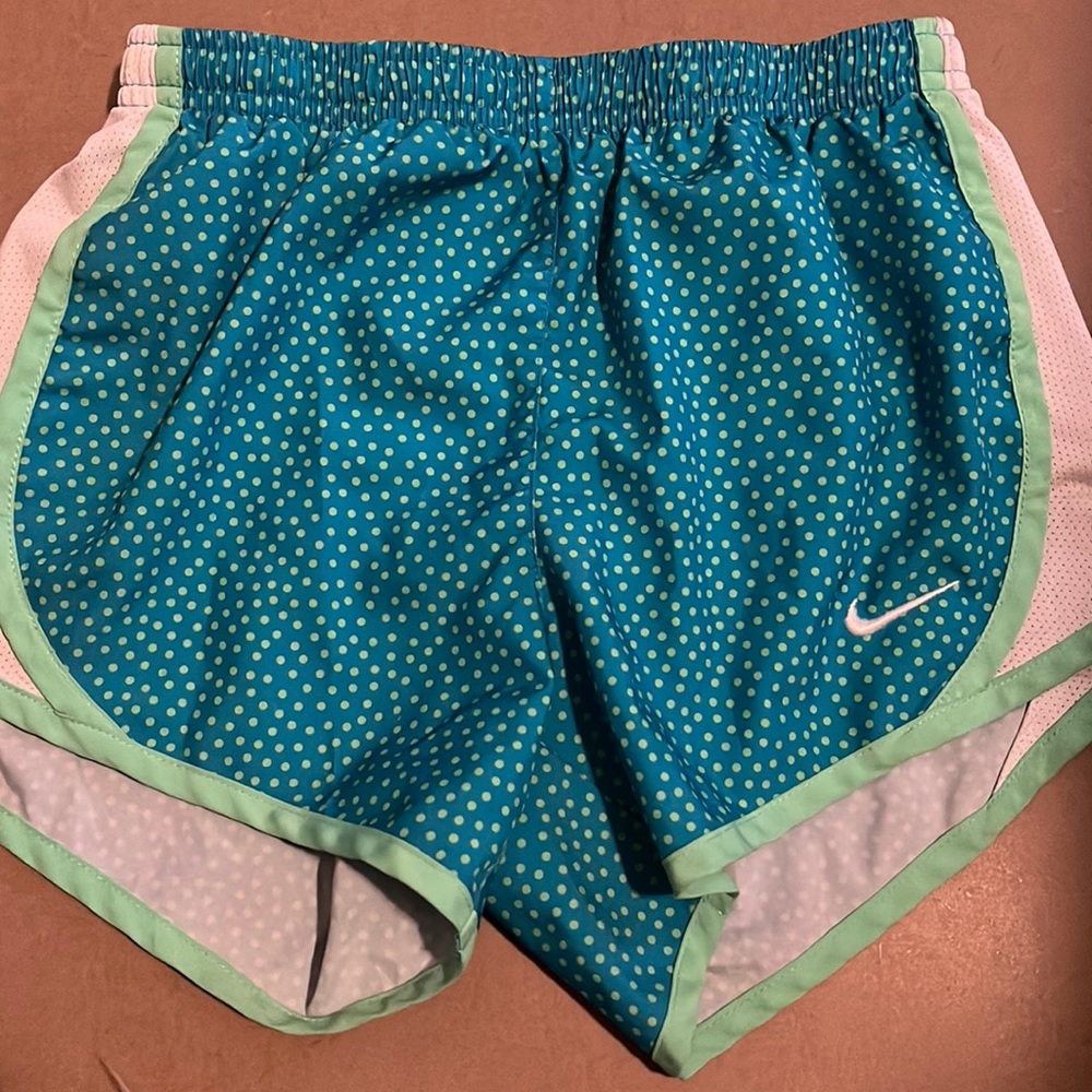 Nike girl running shorts.